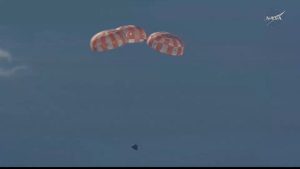 Apollo 15 descends to splashdown